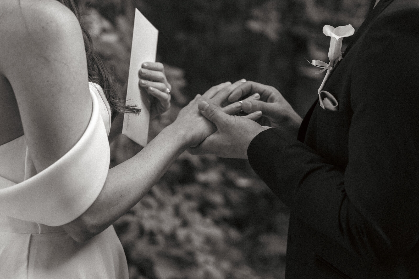 Close-up of hands during the exchange of vows